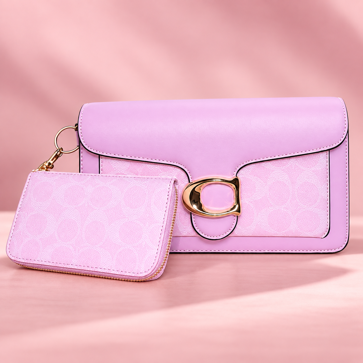 Pink clutch and matching wallet with polished gold clasp